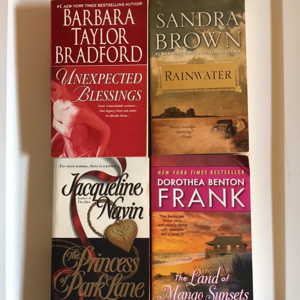 4 used paperback novels by various authors